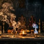 Incense, lamps, and thick smoke fill a small Indian puja room beside an air-quality sensor.